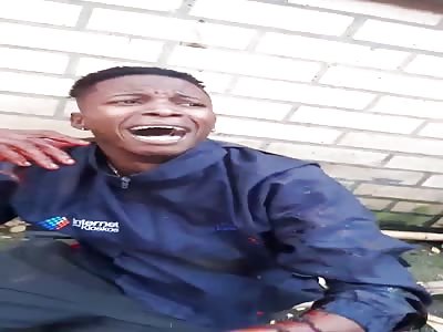 MAN BEING BEATEN BY MOB