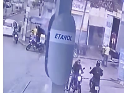 TWO MEN BEING KILLED IN THE MIDLE OF THE STREET