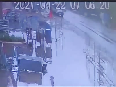 TRUCK SLIDS ON THE WET ROAD AND HITS BIKER HEAD