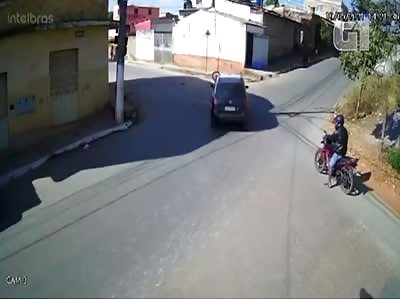 WOMAN DRIVER SENDS BIKER THROUGH THE AIR