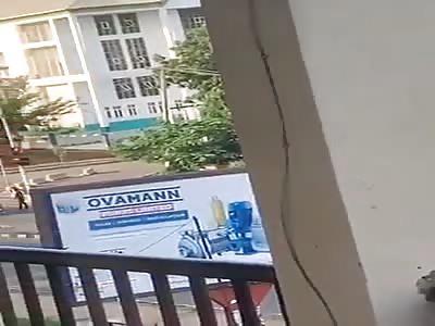 MAN BEING EXECUTED ON THE STREET