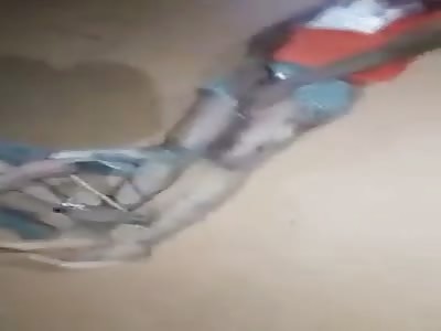 Thief bound after beating.