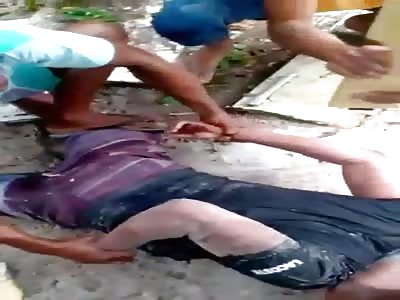 MAN BEING BEATEN LIKE AN ANIMAL 