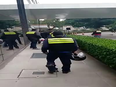 DUDE BEING BEATEN WITH HELMETS