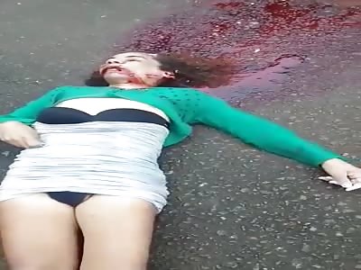 TRANSVESTITE FOUND DEAD ON THE ROAD