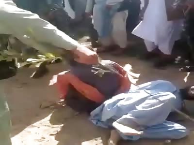 GROUP OF MEN BEING TORTURED