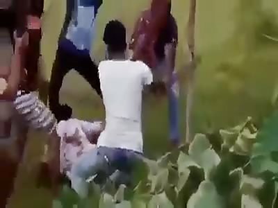 MAN BEING BEATEN 
