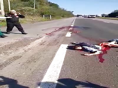 CRUSHED MAN LYING ON THE ROAD