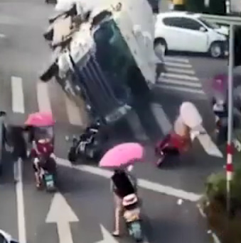  TRUCK OVERTURNED AND CRUSHED A MOTORCYCLE