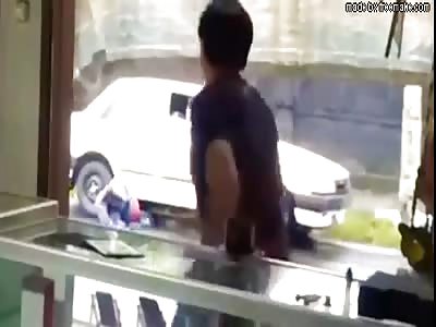 MOTORCYCLIST BEING RUNOVER BY CAR