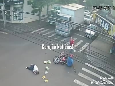 WOMAN INJURED AS MOTORCYCLE DRIVER RAN A RED LIGHT