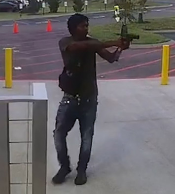 POLICE SHOOT ARMED MAN WHO FIRED AT HIS CO-WORKERS