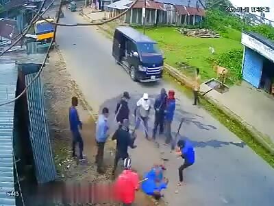 BEATEN TO DEATH WITH MACHETES AND STICKS