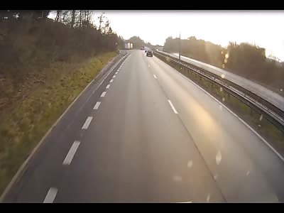 Car Being Crushed Between 2 Trucks