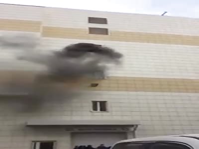 Man jumps from fourth floor window to escape shopping center fire 