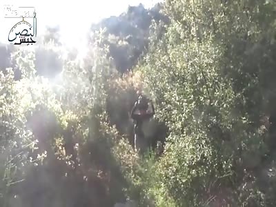 A Syrian patriot gets a hit on a moving vehicle