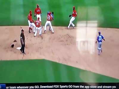 The Texas Rangers  & Toronto Blue Jays playing a game.