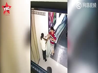 man dies after falling down next to escalator 