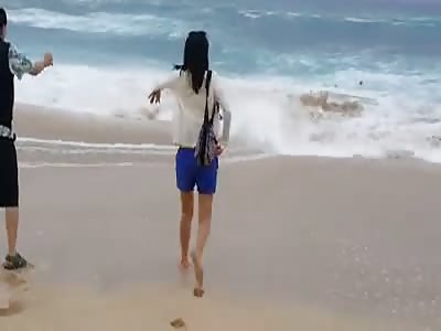 Dad almost lets his son choke because he did not want to get wet