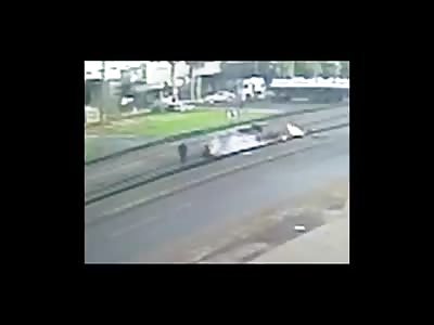 Motorcycle crashes and burns down