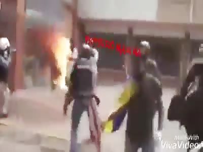 Protester burns in protest