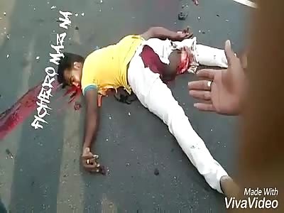 Motorcyclist crushed by truck