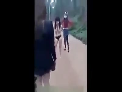 Naked and beaten woman..(go to :20)