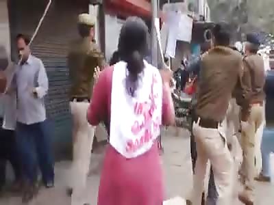 Student demonstrators fight against police