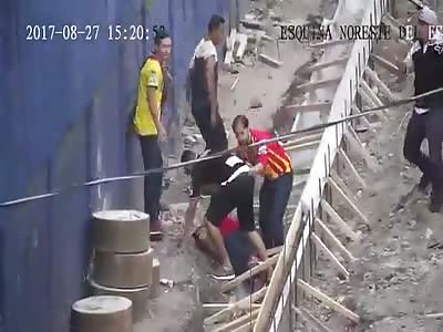 Battle between team bars with man hit with stone on the head (another angle)