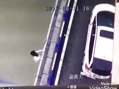 Asian Woman Commits Suicide Jumping  from a Bridge 
