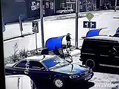 woman flies by the air to be stamped by car