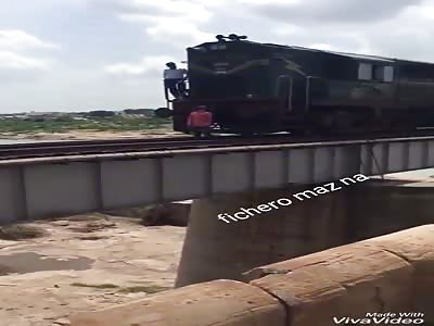 man commits suicide and hangs himself on the train machine