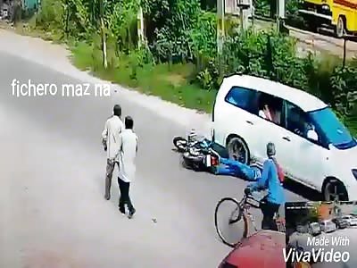 BEAUTIFUL ACCIDENT: automobile crushed by motorcyclist