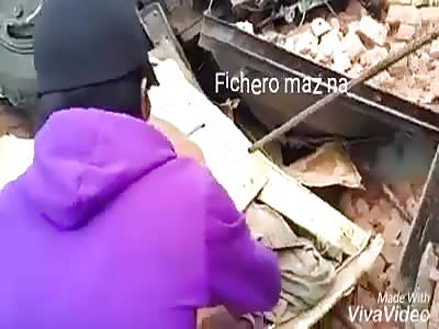 ACCIDENT: truck dumps and driver is pressed