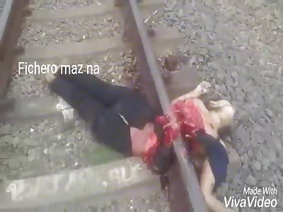 SUICIDE: Woman goes on track and is split in two