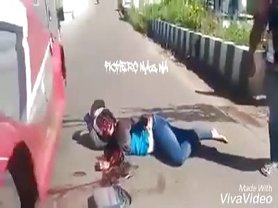 ACCIDENT: woman suffers when being fired by van