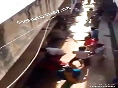 MAN IS STRIKED BY FRUIT PEOPLE