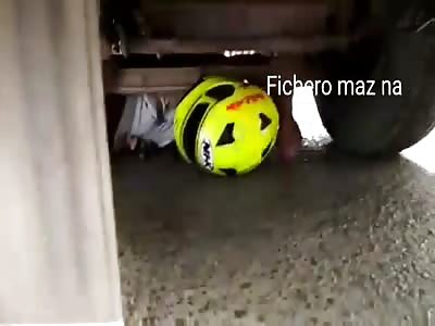 MOTORCYCLE RESTING UNDER THE AUTO