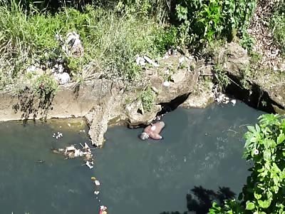 BODY OF MAN IS FOUND IN RIO CAUSE