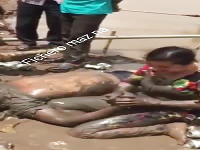 WOMAN CRIES HER DEAD MAN