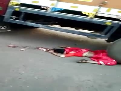 WOMEN MOTORCYCLE DIES CRUSHED BY TRUCK