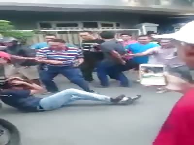 THIEVES HIT BY THE CROWD