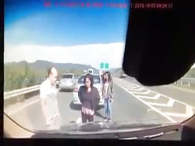 Brutally Sandwiched Between Two Cars