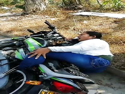 Chubby Girl Stuck in the Rear Wheel of Motorcycle