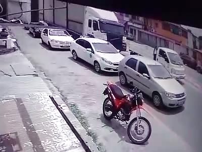 Two Women fall Under Huge Truck