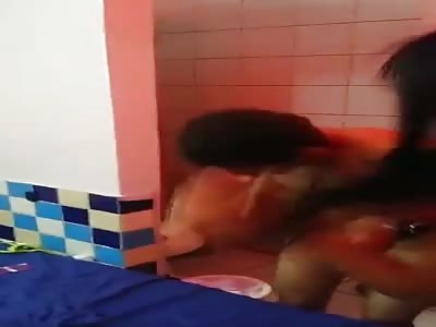 WOMAN HITS INFIEL HUSBAND