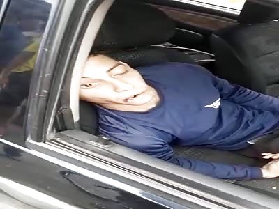 Gang member in Car Ambushed and Riddled with Bullets