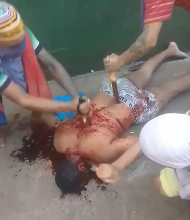 Absolutely Brutal..Brazilian Inmate Stabbed Dozens of Times