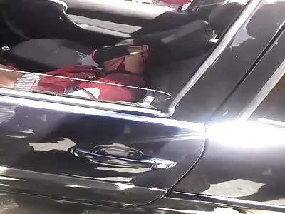 man shot dead in his car