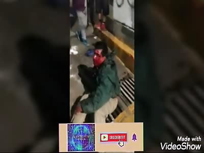 angry people beat suspected aggressor